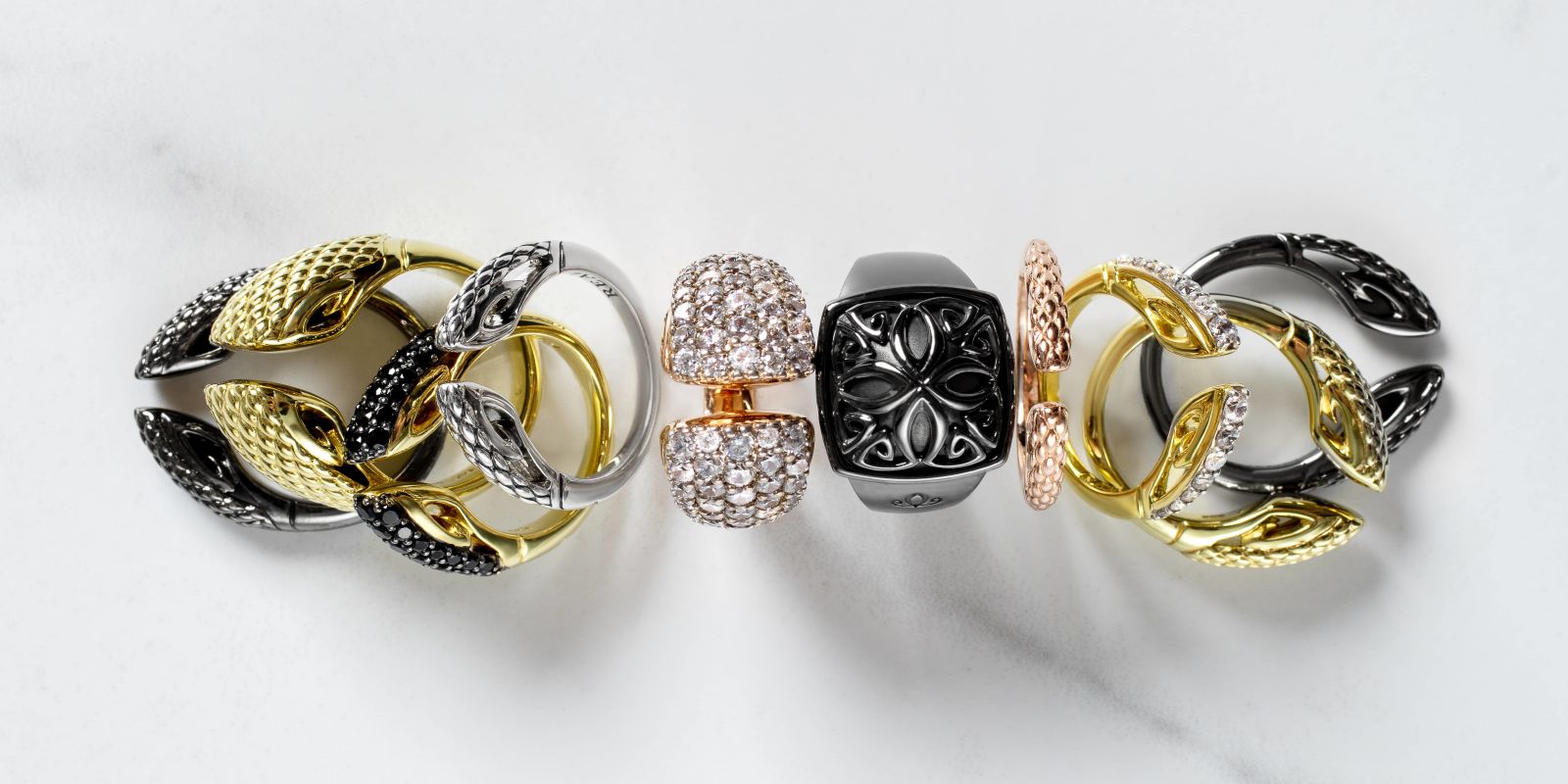A Group Of Gold And Silver Rings